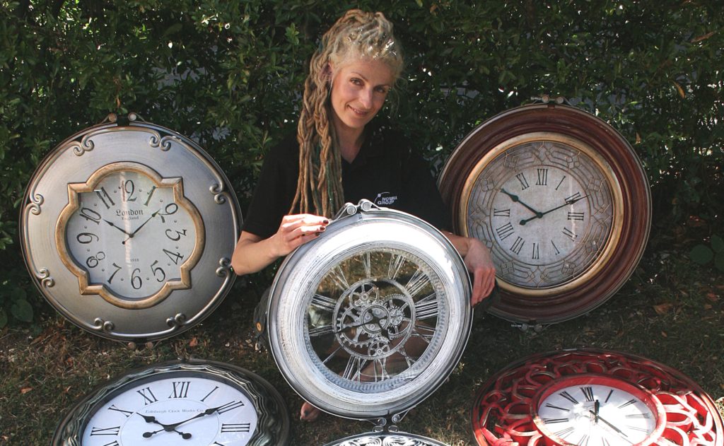 Karolina Olszanska with her clocks that she made from NORMA Group products.