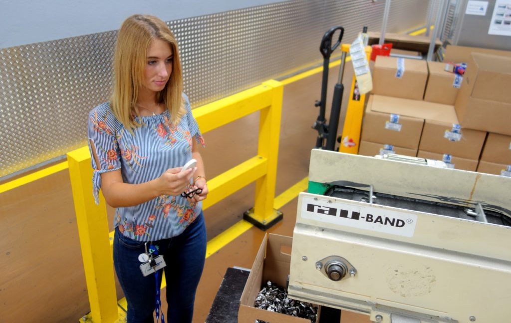 Laura Merdenz tracks how many clamps are assembled in a given time.