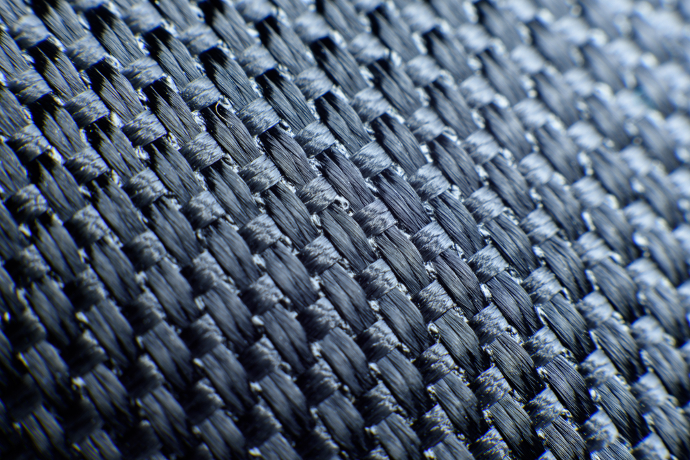 The surface condition of carbon fibers in a macro close-up.