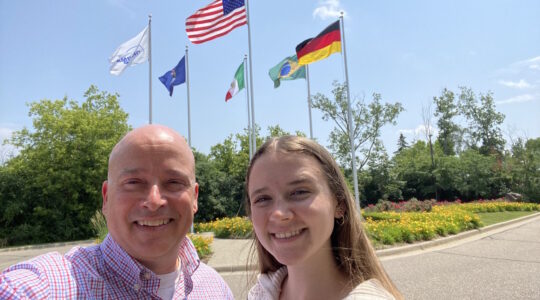 Image of David and Jillian Carosella in front of NORMA Group Auburn Hills