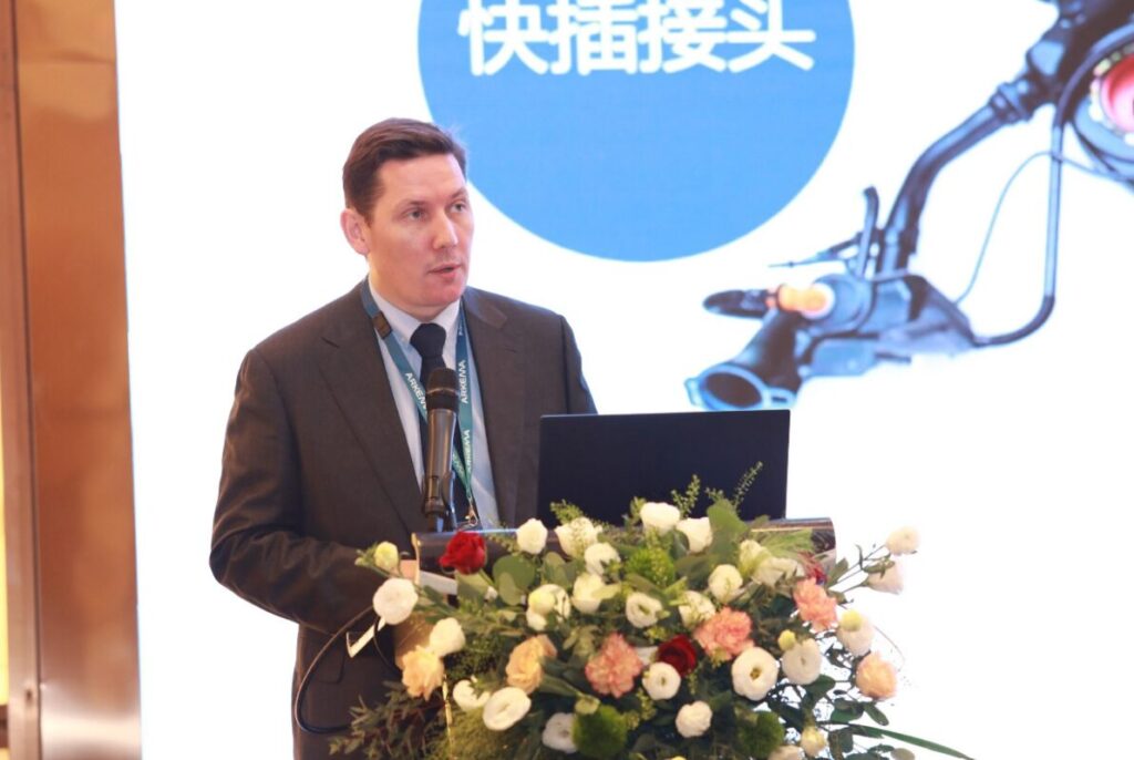 Image of Jean-Francois Surleve speaking at a conference in China