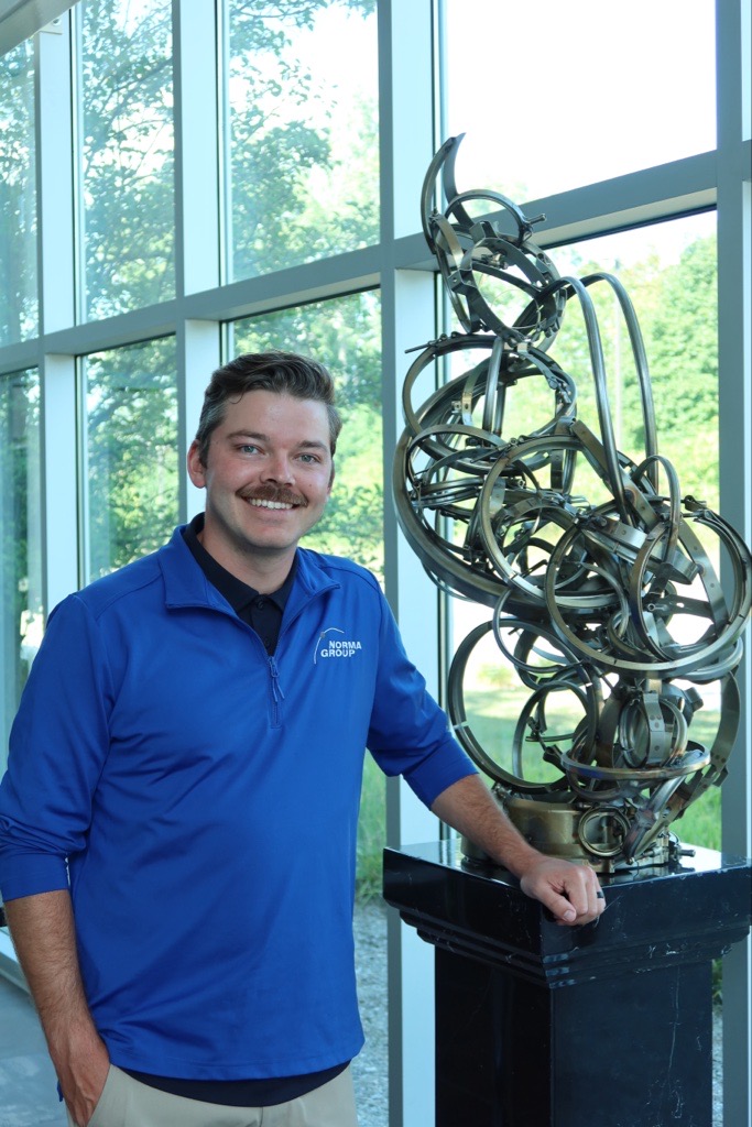 Image of Lee Teasley with NORMA Group products
